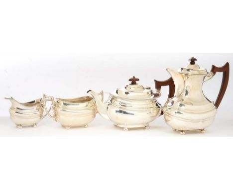A GEORGE V FOUR PIECE SILVER COFFEE AND TEA SERVICE, BIRMINGHAM 1932, 63OZS 14DWTS (4)++GOOD CONDITION