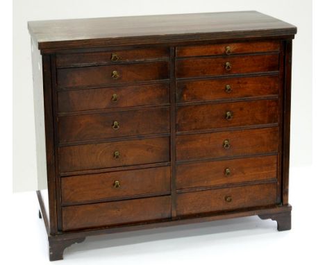 A GEORGE III MAHOGANY COLLECTOR'S CABINET OF TWO BANKS OF SEVEN GRADUATED DOORS, ON BRACKET FEET, 59CM L, ALTERED 