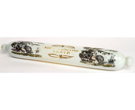 A VICTORIAN MILK GLASS ROLLING PIN WITH TWO PAINTED TRANSFER PRINTS OF A SEATED WOMAN AND (WORN) PAINTED INSCRIPTION JOB AND 