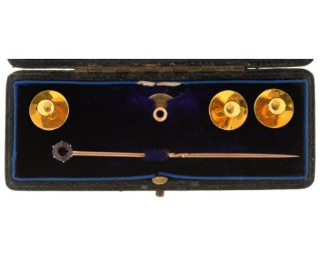 THREE 18CT GOLD DRESS STUDS, A FURTHER GOLD DRESS STUD AND A GARNET STICK PIN IN GOLD, CASED, 5.5G++LIGHT WEAR CONSISTENT WIT