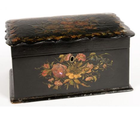 A VICTORIAN PAPIER MACHE TEA CADDY, INLAID IN MOTHER OF PEARL AND PAINTED WITH FLOWERS, THE DIVIDED INTERIOR RETAINING A PAIR