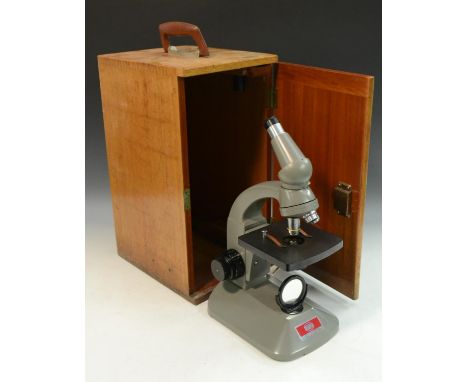 A Beck Diamax microscope, x10 eyepiece and three objectives giving magnification up to x450, substage condenser, grey finish,