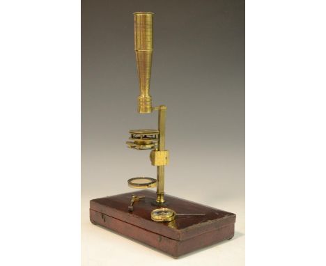 A 19th century lacquered brass travelling microscope, rack and pinion adjustment, morocco case, the hinged cover with screw-t