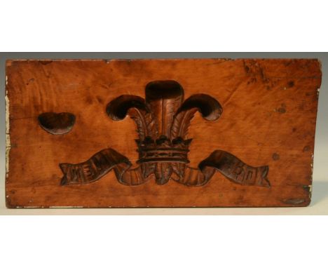 An early 19th century architectural stucco mould, carved intaglio with Prince of Wales feathers, 16.5cm wide 