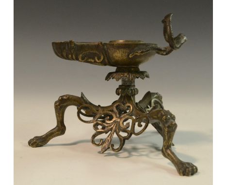 A 19th century Grand Tour type table oil lamp, after the Antique Roman, twin-serpent handles, tripod base with lion monopodia