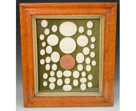 An arrangement of Grand Tour plaster intaglio impressions, The Colosseum, Frederick Duke of York and Albany, and various Clas
