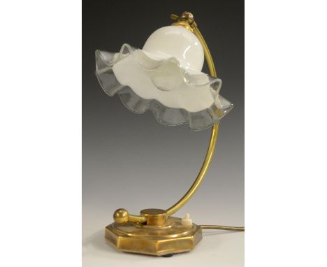 An Art Nouveau style brass adjustable C-frame desk or reading lamp, opaque glass shade with frilled border, octagonal base, 3