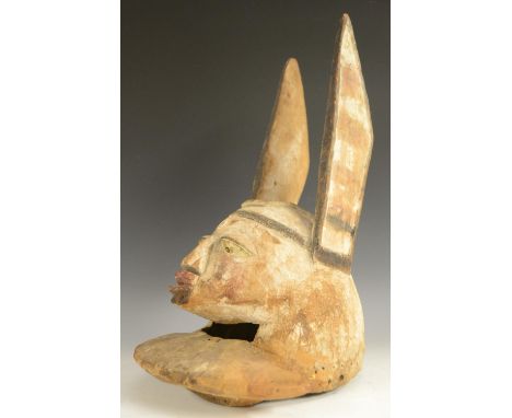 Tribal Art - a Yoruba Gelede (Efe-Agasa) helmet mask, carved as a zoomorphic rabbit, tall pointed ears, stylised features, de