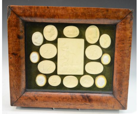 An arrangement of plaster intaglio impressions, various Grand Tour Classical subjects, 19cm x 24cm, maple frame