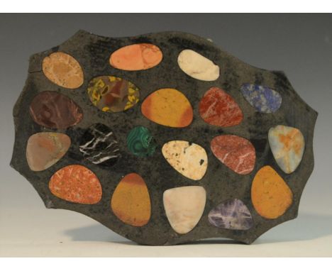A pietra dura shaped oval desk weight, inlaid with pebble shaped reserves of malachite, amethyst quartz, lapis lazuli and oth