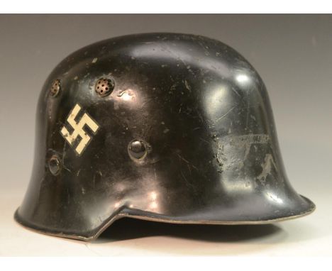 World War Two - Nazi Germany/Third Reich - a M34 Feuerschutzpolizei (Fire Protection Police) double-decal helmet, the left te