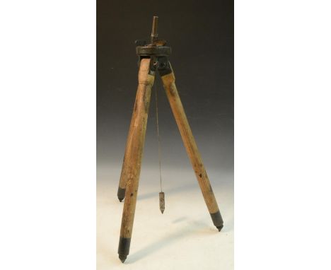 An 18th century surveying tripod, for use in the field, mining or campaign, brass fittings,the top plate 9.5cm diam 