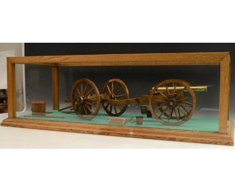 Militaria: a 1/10th scale model of a British 9pdr. field piece as used during the French wars, in timber and brass, with turn