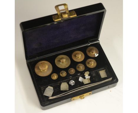 A set of scientific scale weights, for weighing fine fractions, bakelite case, 11.5cm wide, c.1935