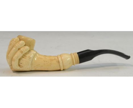 Folk Art - an unusual 19th century bone and two-tone horn pipe, boldly carved as a hand grasping the cylindrical bowl, scroll