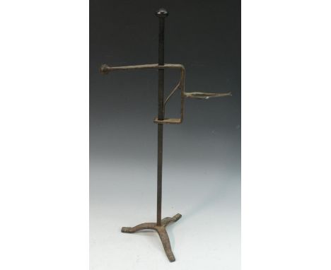 A 19th century wrought iron tripod adjustable lark spit, 48.5cm high