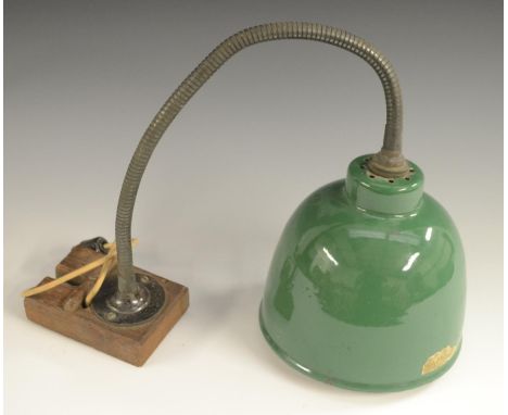 A mid-20th century industrial articulated swan neck lamp, the green enamelled shade 17.5cm diam 