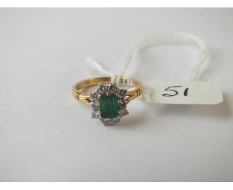 A emerald &amp; diamond cluster ring in 18ct gold - size K - 3.1gms