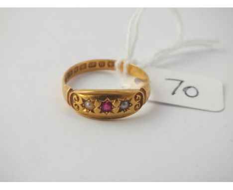 A Victorian ruby and pearl three stone ring in 18 ct gold - Size Q - 3.2gms.