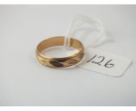 A small wedding band in 9 ct - Size K - 1.6gms.