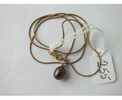 A black pearl and diamond pendant on snake chain both 9 ct - 3.7gms