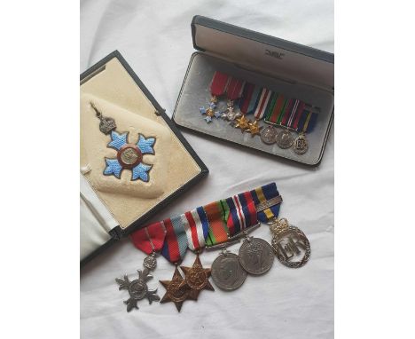 A group of WWII medals to Major John Magnus Grey with CBE, MBE, army emergency reserve with miniatures (unnamed)