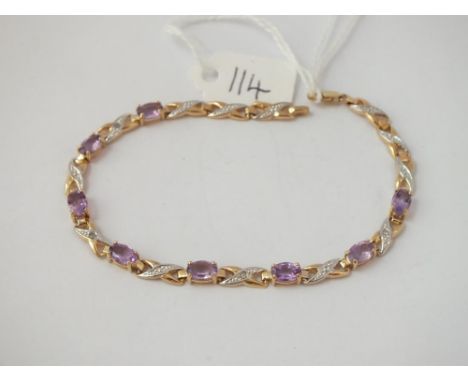 An amethyst and diamond line bracelet - 3.7gms.