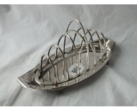 A good seven bar toast rack on bracket feet - 9" long - Sheffield 1929 by HA - 324gms