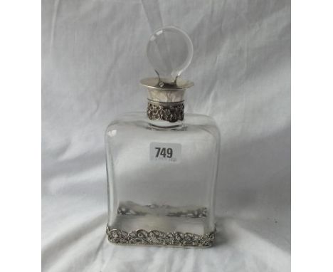 A continental (800 standard) decanter with engraved glass body - 9" over stopper 