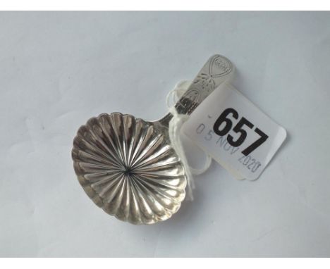 A George III caddy spoon with oval fluted bowl
