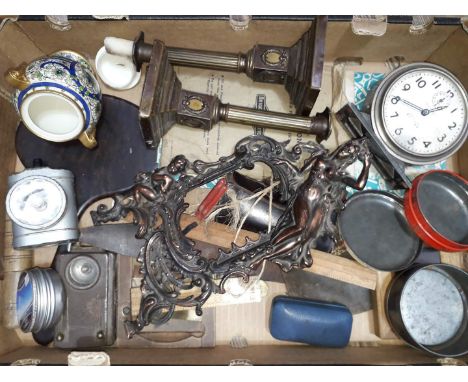 A box of assorted items including a Westclox Big Ben alarm clock, an ornate metal photograph frame, bicycle lamps, rules etc.