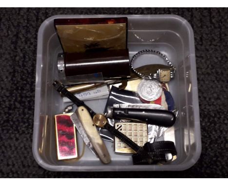 A box of assorted bric a brac including trench art, watches, penknives, WWI embroidered postcards etc. 