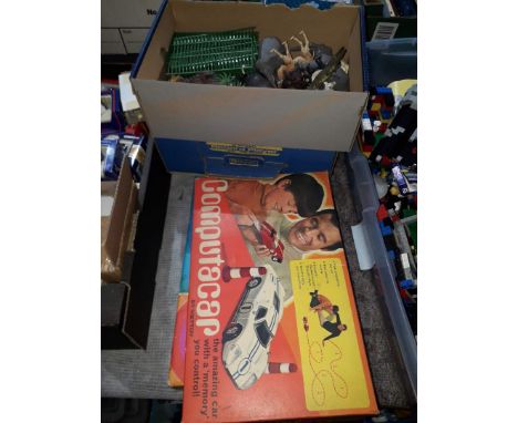 Assorted vintage toys comprising a Philips engineer set, Computer Car, a Goldentone 2 speed record player and a box of plasti