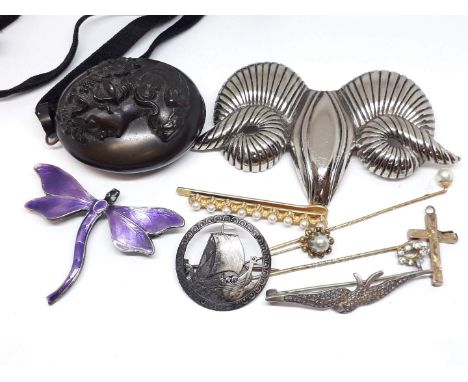 A mixed lot of antique and vintage jewellery including a Victorian vulcanite locket, a hallmarked silver and enamel dragonfly