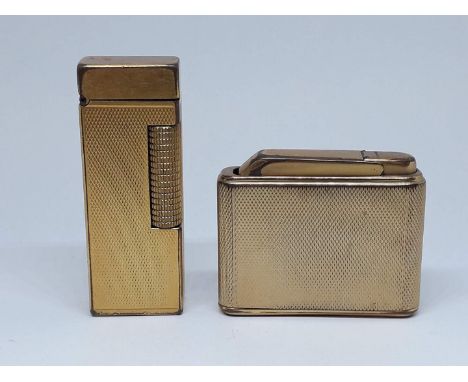 A gold plated Dunhill lighter and a Colibri lighter. 