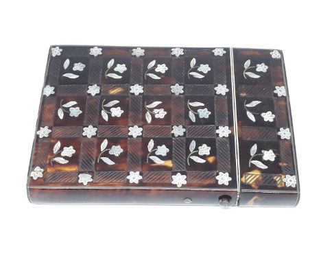 A Victorian mother of pearl inlaid tortoiseshell card case 7.5cm x 10.5cm.Condition:- General wear through age and use, damag