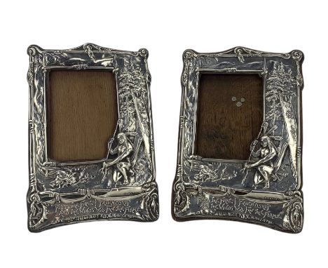 Pair of Edwardian silver photograph frames embossed with a scene from Longfellows Hiawatha with a kneeling Native American br