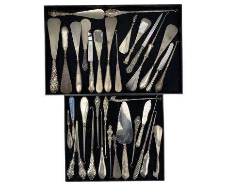 Victorian and later silver handled shoe horns, button hooks, glove stretchers and similar articles including a pair of guillo