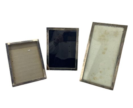  Silver photograph frame on easel stand 25cm x 13cm Birmingham 1946, another 20cm x 14cm and another 18cm x 13cm (3) 