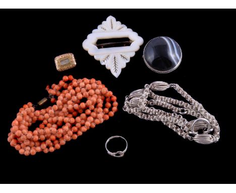 Y A four row coral bead necklace, the uniform coral beads measuring approximately 5mm diameter, to a git metal barrel clasp, 