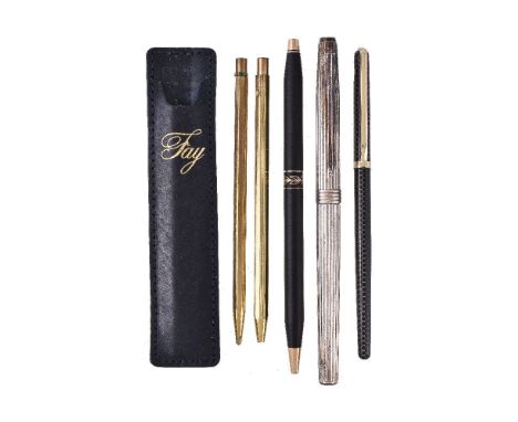 A silver coloured rollerball pen, with striated decoration, the cap with clip; Cross, a matt black ballpoint pen, with a foli