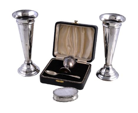 A pair of Edwardian silver tapered vases by William Hutton & Sons, Birmingham 1908, 20cm (8in) high, loaded; a christening eg