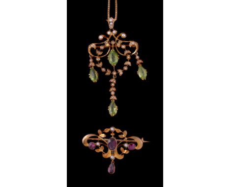 An Edwardian peridot and seed pearl pendant, the central marquise cut peridot within a scrolling foliate surround set with se