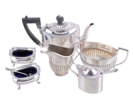 A small mixed collection of silver, comprising a matched oval half fluted three piece bachelor's tea service, the tea pot wit