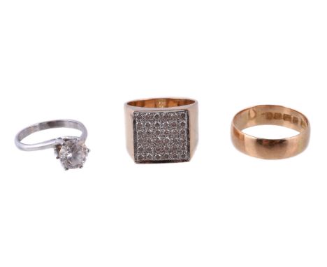 A diamond ring, the square panel set with brilliant cut diamonds, approximately 0.40 carats total, stamped 18, finger size J 