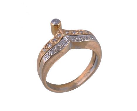 A diamond dress ring by Cadeaux, the two colour wishbone shaped ring set with brilliant cut diamonds, with a brilliant cut di