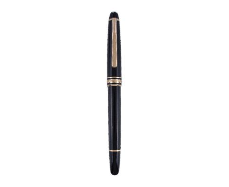 Montblanc, Meisterstuck Pix, a black rollerball pen, the cap with a gilt metal clip and triple cap band, with a Montblanc bla