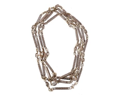A fancy link long chain, with pierced oval and baton links, with a later added split ring clasp, stamped 9ct, 74cm long, 48g