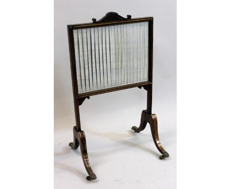 Regency rosewood brass inlaid firescreen, raised on splay supports with claw feet 