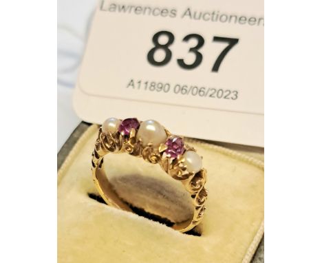 Small late 19th / early 20th Century yellow metal pink ruby and split pearl five stone ring, size I, 2.6gPink rubies, not hal
